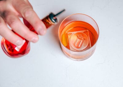 A Method & Muse cocktail with branded ice