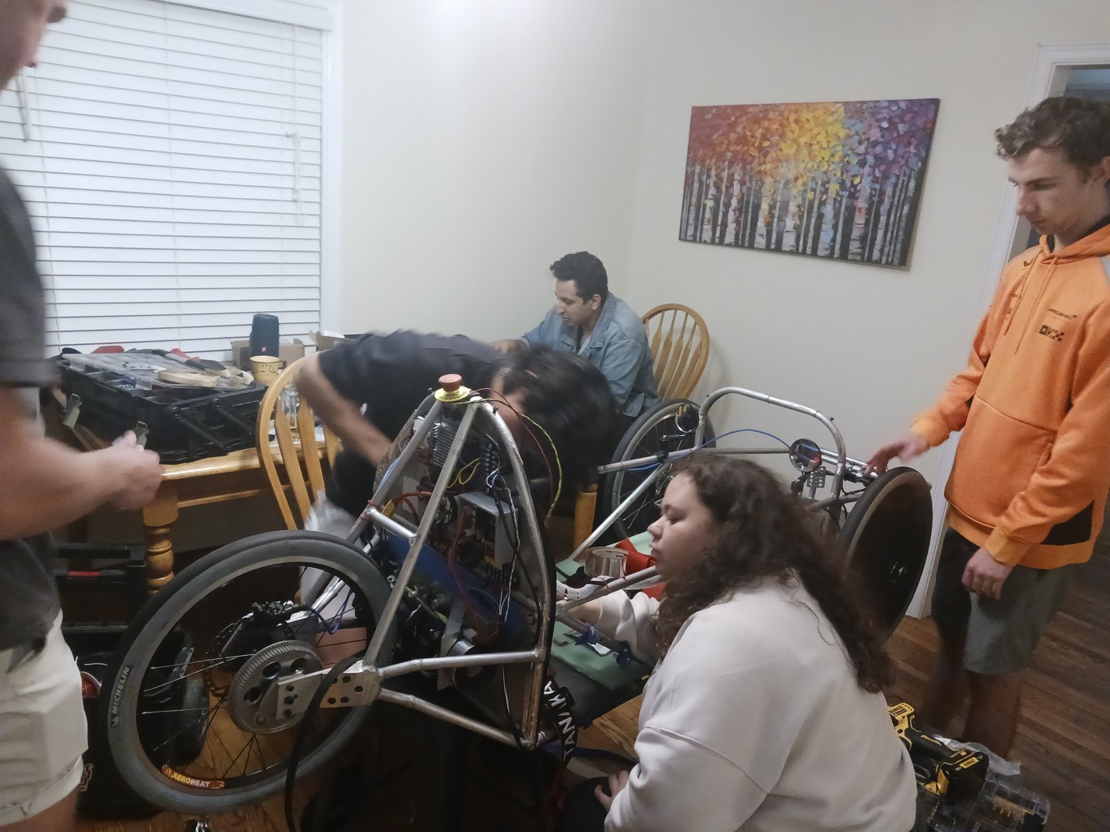 Shell Eco-marathon team doing late-stage build work in the kitchen